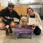 Paradise Pet Parks - puppy preschool graduate with proud parents